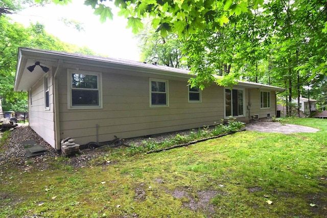 3333 N 12th St, Wausau, WI 54403 - rear view of property featuring a yard and a patio area