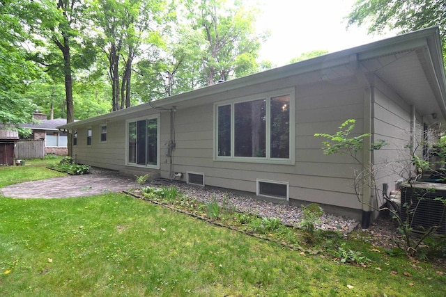 3333 N 12th St, Wausau, WI 54403 - rear view of property with a patio and a yard