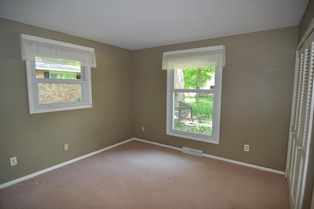 3333 N 12th St, Wausau, WI 54403 - unfurnished bedroom with carpet floors and baseboards