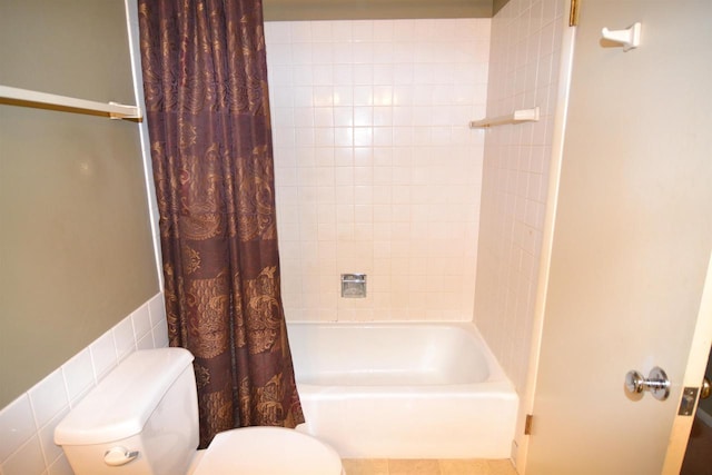 3333 N 12th St, Wausau, WI 54403 - bathroom featuring shower / bath combo with shower curtain and tile walls