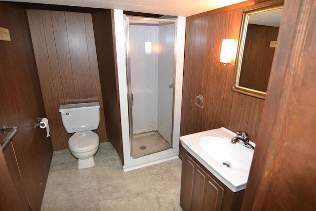 3333 N 12th St, Wausau, WI 54403 - bathroom featuring a stall shower, vanity, and wood walls