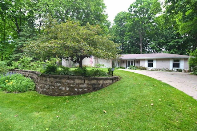 3333 N 12th St, Wausau, WI 54403 - view of front of property with a front yard and concrete driveway