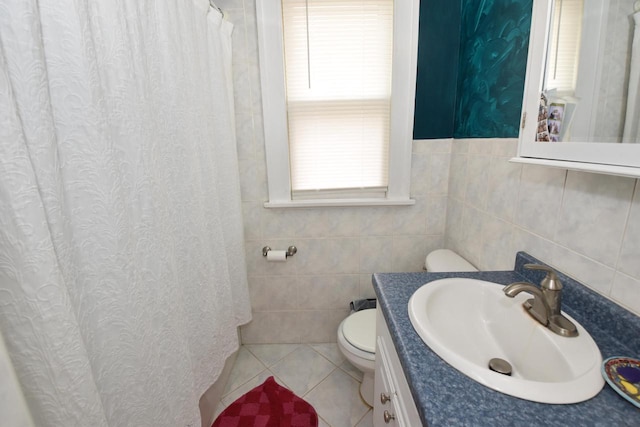 1032 Russet St, Racine, WI 53405 - full bath featuring vanity, tile walls, tile patterned floors, and a shower with curtain