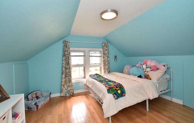 1032 Russet St, Racine, WI 53405 - bedroom with wood finished floors and lofted ceiling