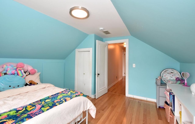 1032 Russet St, Racine, WI 53405 - bedroom featuring light wood finished floors and lofted ceiling