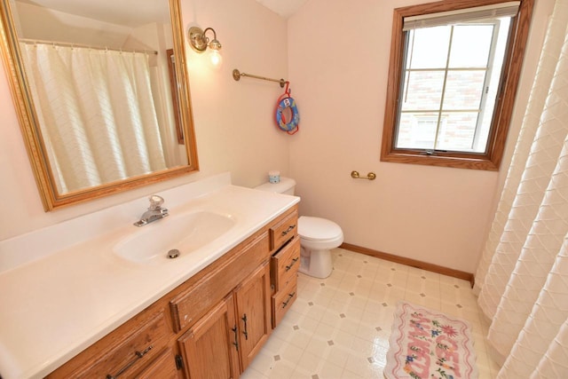 1032 Russet St, Racine, WI 53405 - full bathroom with vanity, tile patterned floors, and a shower with curtain
