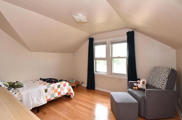 1032 Russet St, Racine, WI 53405 - bedroom with vaulted ceiling and light wood-type flooring