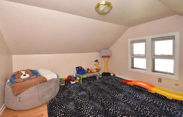 1032 Russet St, Racine, WI 53405 - rec room with vaulted ceiling and light wood-type flooring