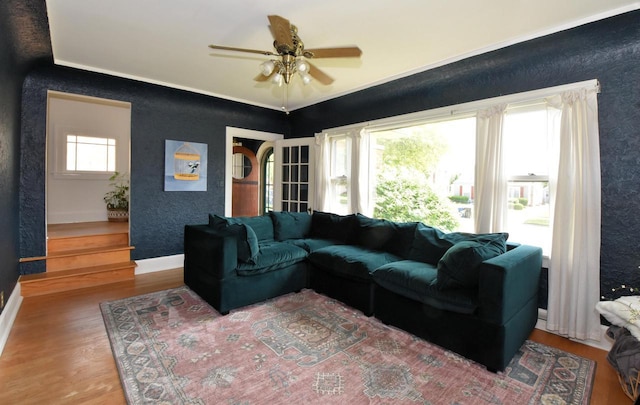 1032 Russet St, Racine, WI 53405 - living room with wood finished floors, ceiling fan, and ornamental molding