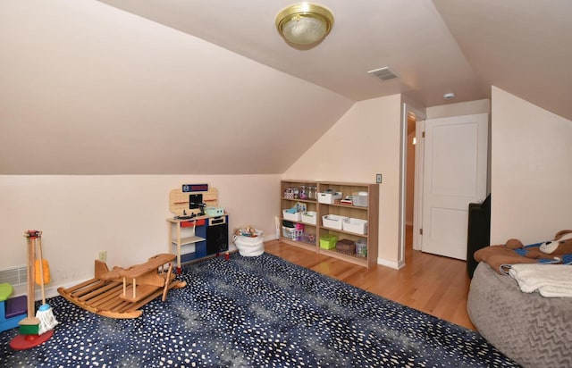 1032 Russet St, Racine, WI 53405 - playroom featuring wood finished floors and lofted ceiling