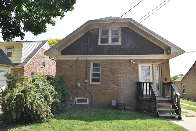 1032 Russet St, Racine, WI 53405 - back of property with a yard and brick siding