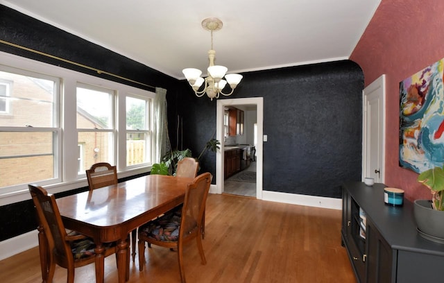 1032 Russet St, Racine, WI 53405 - dining room with a chandelier and light wood-style floors