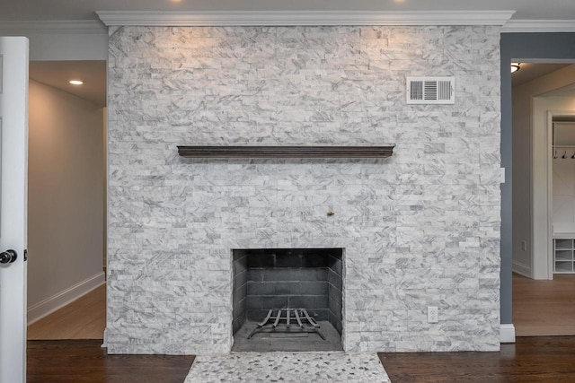 1120 N 124th St, Wauwatosa, WI 53226 - detailed view of crown molding, wood finished floors, and a fireplace