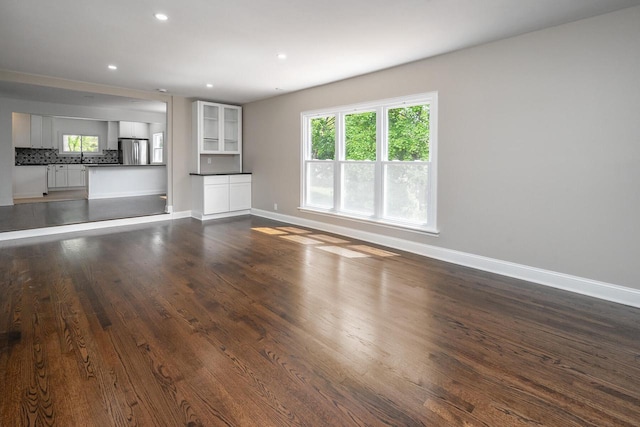 1120 N 124th St, Wauwatosa, WI 53226 - unfurnished living room featuring dark wood finished floors and recessed lighting