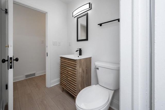 1120 N 124th St, Wauwatosa, WI 53226 - bathroom with vanity and wood finished floors