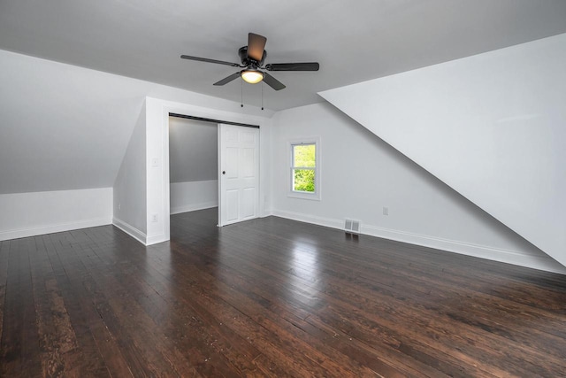 1120 N 124th St, Wauwatosa, WI 53226 - additional living space with dark wood finished floors, a ceiling fan, and lofted ceiling