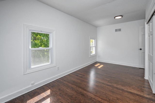 1120 N 124th St, Wauwatosa, WI 53226 - unfurnished room featuring plenty of natural light and dark wood-style floors