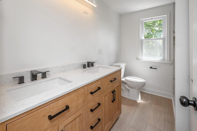 1120 N 124th St, Wauwatosa, WI 53226 - bathroom with wood finished floors and double vanity