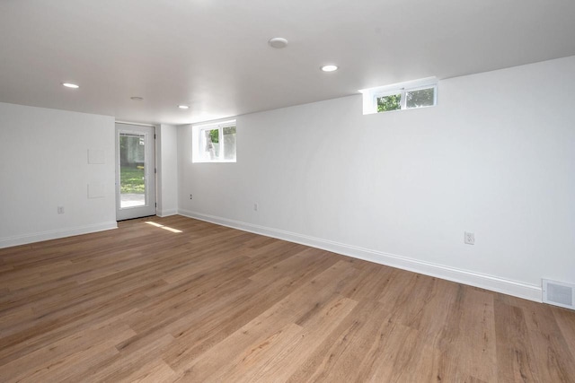 1120 N 124th St, Wauwatosa, WI 53226 - unfurnished room with light wood-style floors and recessed lighting