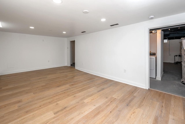 1120 N 124th St, Wauwatosa, WI 53226 - unfurnished room with washer / clothes dryer, light wood-style floors, recessed lighting, and a smoke detector