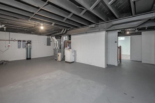 1120 N 124th St, Wauwatosa, WI 53226 - basement with heating unit, electric panel, and a water softener system