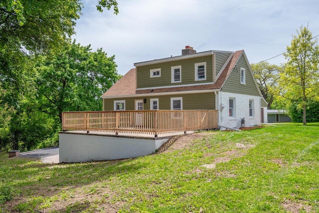 1120 N 124th St, Wauwatosa, WI 53226 - rear view of house with a chimney, a yard, and a wooden deck