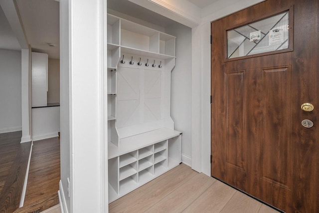 1120 N 124th St, Wauwatosa, WI 53226 - mudroom with wood finished floors and baseboards
