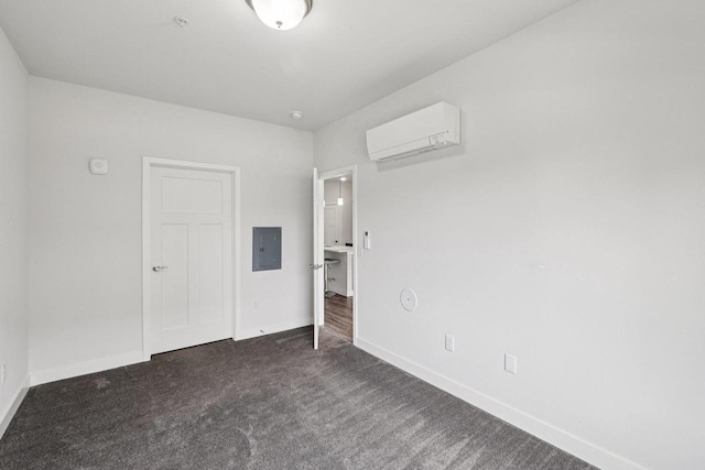 1601 N Windsor Ave Unit 106, Cottage Grove, WI 53527 - unfurnished bedroom with a wall unit AC, carpet flooring, and electric panel