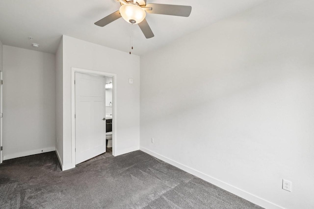 1601 N Windsor Ave Unit 106, Cottage Grove, WI 53527 - unfurnished bedroom with dark carpet and ceiling fan