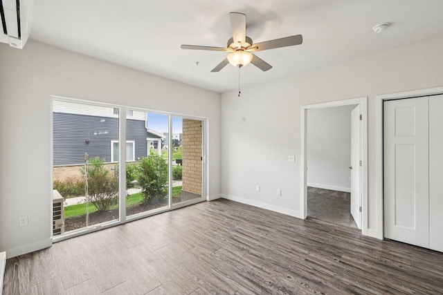1601 N Windsor Ave Unit 106, Cottage Grove, WI 53527 - spare room with a smoke detector, ceiling fan, and wood finished floors