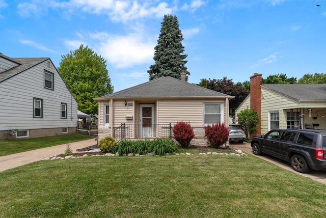 1961 S 94th St, West Allis, WI 53227 - bungalow-style home featuring a front lawn