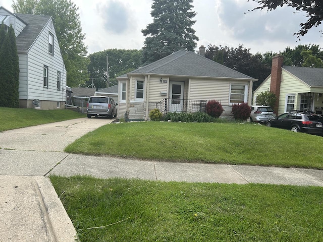 1961 S 94th St, West Allis, WI 53227 - view of front of home featuring a front lawn