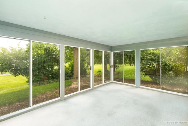 1813 Countryside Dr, Middleton, WI 53562 - unfurnished sunroom featuring healthy amount of natural light and carpet floors
