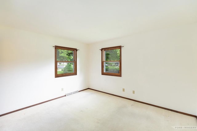 1813 Countryside Dr, Middleton, WI 53562 - empty room with plenty of natural light and light carpet