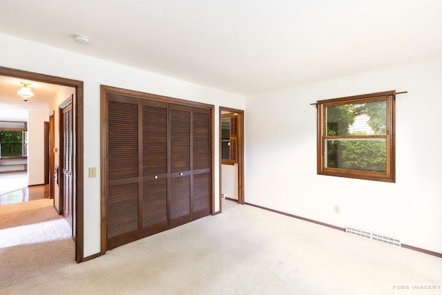 1813 Countryside Dr, Middleton, WI 53562 - unfurnished bedroom with light colored carpet and baseboards