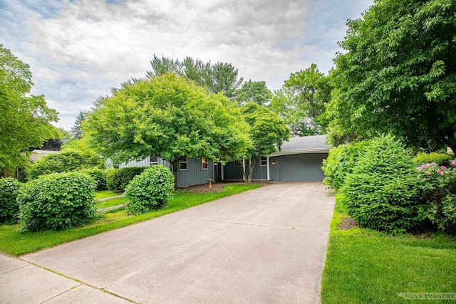1813 Countryside Dr, Middleton, WI 53562 - obstructed view of property featuring driveway and an attached garage