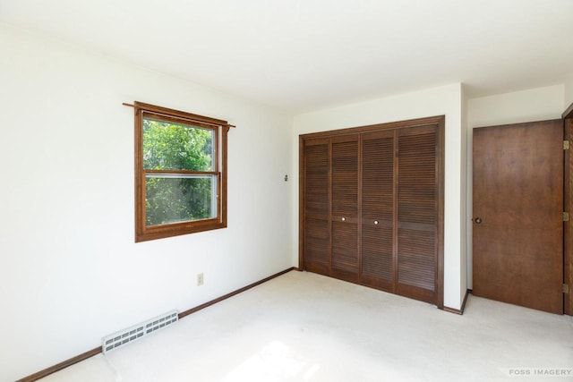 1813 Countryside Dr, Middleton, WI 53562 - unfurnished bedroom featuring light carpet and a closet