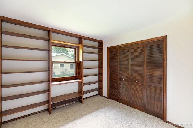 1813 Countryside Dr, Middleton, WI 53562 - unfurnished bedroom featuring light carpet and a closet