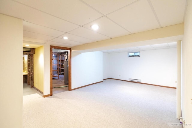 1813 Countryside Dr, Middleton, WI 53562 - finished basement featuring baseboard heating, carpet, recessed lighting, gas water heater, and a paneled ceiling