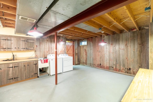 1813 Countryside Dr, Middleton, WI 53562 - below grade area with washing machine and dryer and wood walls