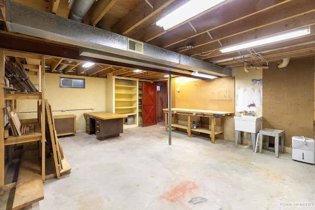 1813 Countryside Dr, Middleton, WI 53562 - unfinished basement featuring a workshop area