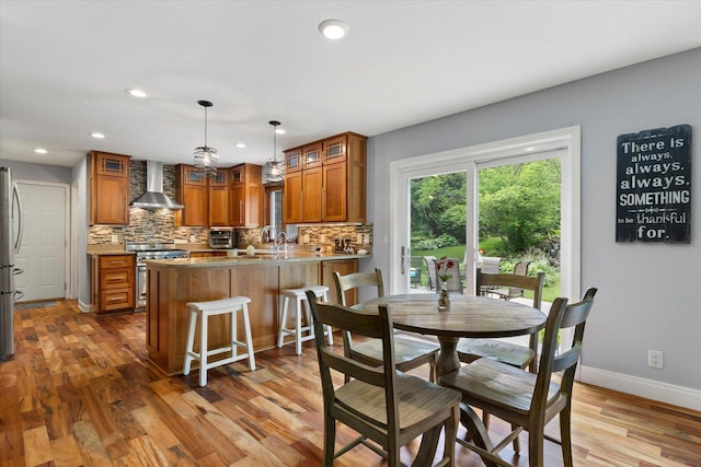 N80W32229 Northbrook Ct, Hartland, WI 53029 - dining room with wood finished floors and recessed lighting