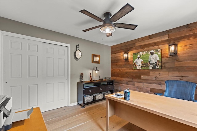 N80W32229 Northbrook Ct, Hartland, WI 53029 - office area with wood walls, a ceiling fan, and light wood-style floors