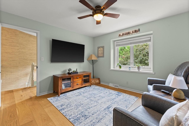N80W32229 Northbrook Ct, Hartland, WI 53029 - living area with ceiling fan and wood finished floors