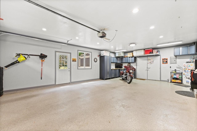 N80W32229 Northbrook Ct, Hartland, WI 53029 - garage featuring recessed lighting and a garage door opener