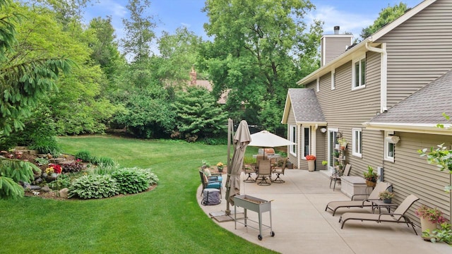 N80W32229 Northbrook Ct, Hartland, WI 53029 - view of green lawn with a patio and view of scattered trees