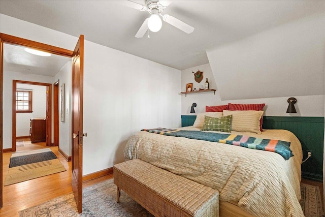 4705 Gordon Ave, Monona, WI 53716 - bedroom featuring light wood-style flooring, vaulted ceiling, and ceiling fan