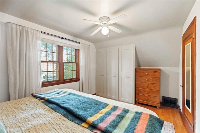 4705 Gordon Ave, Monona, WI 53716 - bedroom featuring light wood-style floors, a closet, and a ceiling fan