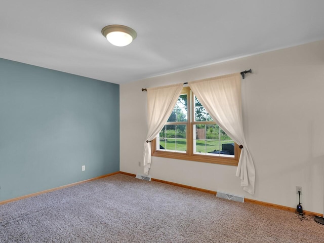 26317 Dukleth Dr, Waterford, WI 53185 - unfurnished room featuring carpet floors and baseboards