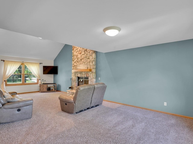 26317 Dukleth Dr, Waterford, WI 53185 - living area with a fireplace, carpet flooring, and vaulted ceiling